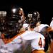 Tecumseh junior RJ Walch yells on the sidelines during the second half of the game against Milan on Friday. Tecumseh won 26-6. Daniel Brenner I AnnArbor.com
